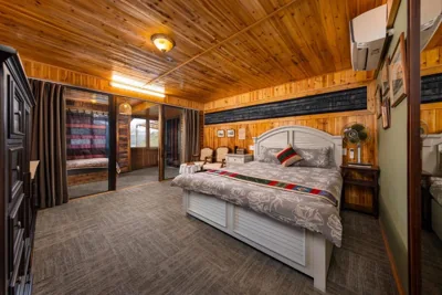 Deluxe Double Room with Balcony — Ta Phin Cottage