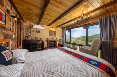 Junior Suite with Mountain View — Ta Phin Cottage